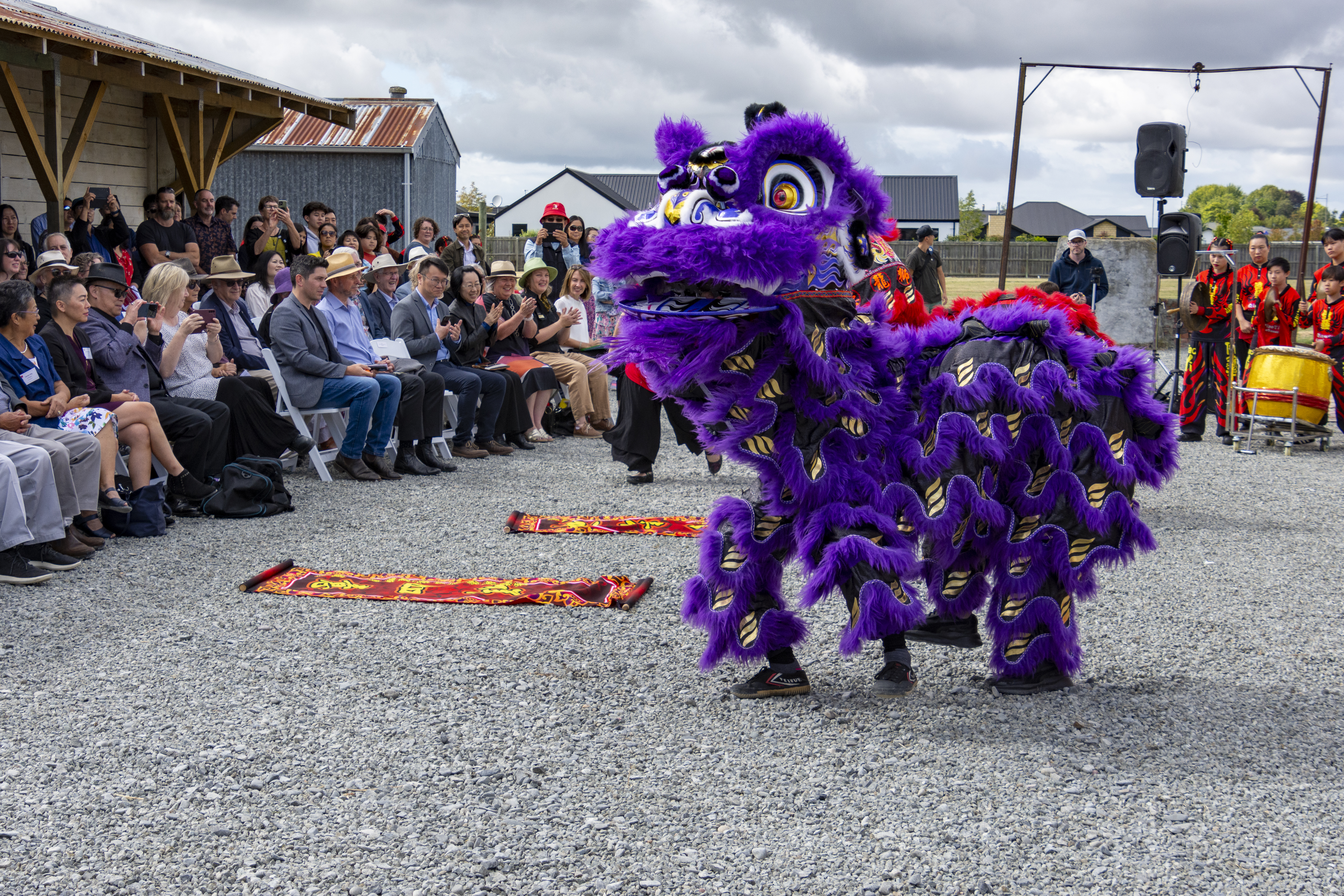 Qiao Yi Hong De Lion Dance Team performing at the official opening of the Ng King Bros. Community Heritage Park, 25 February 2024. Courtesy of the Canterbury branch of the NZ Chinese Association.